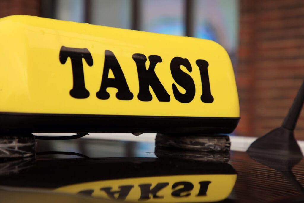 taksin kyltti